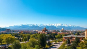 Experience the captivating scenery of https://albmaftoh.com, showcasing Almaty's vibrant cityscape against stunning mountains.